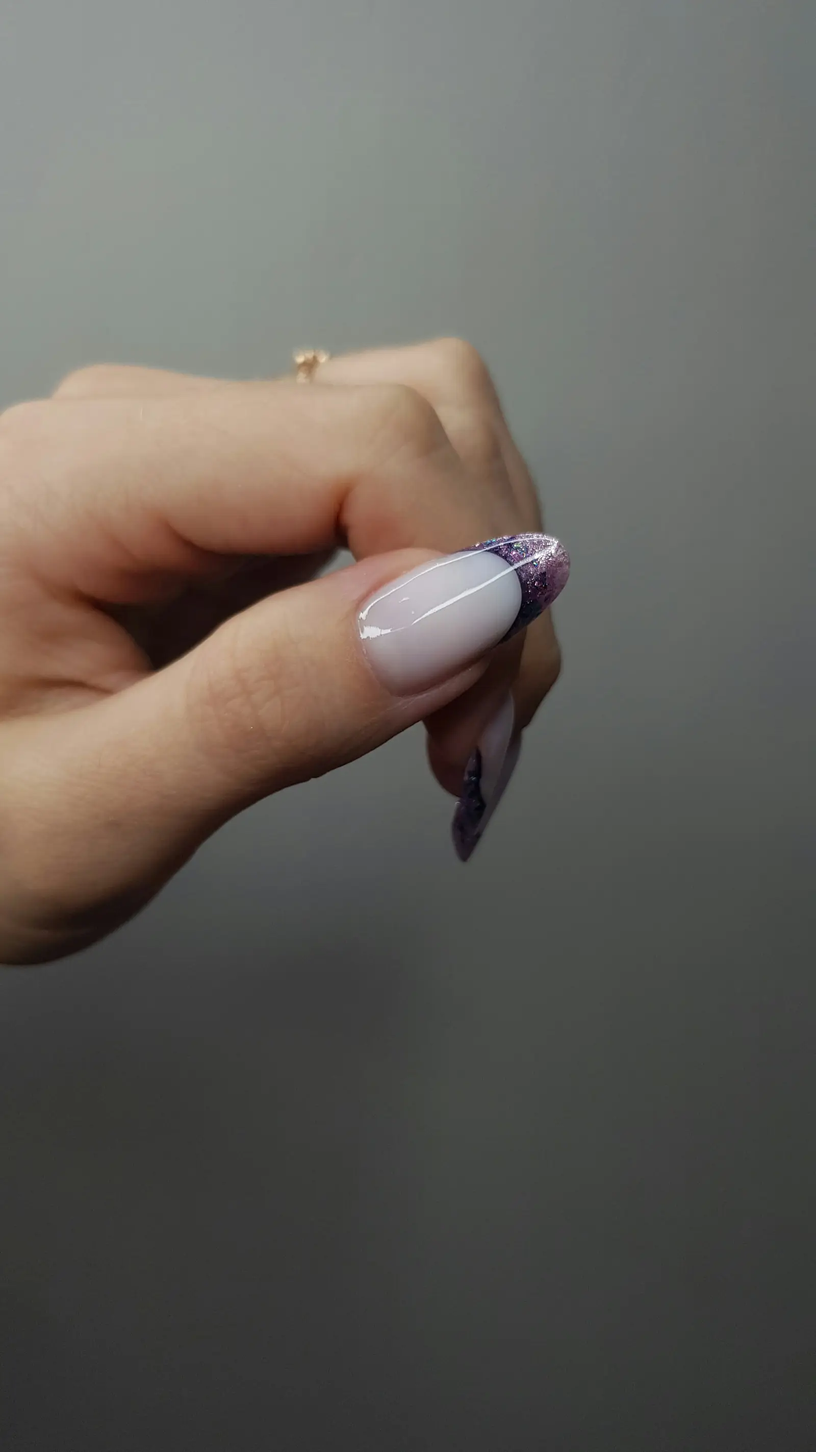 French manicure with glitter accents