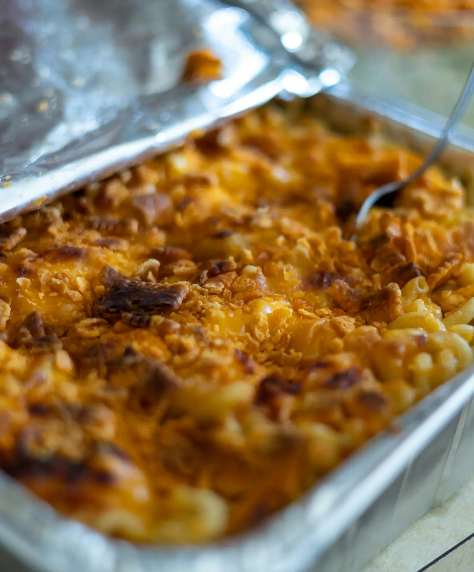 Pan of baked mac and cheese with browned edges